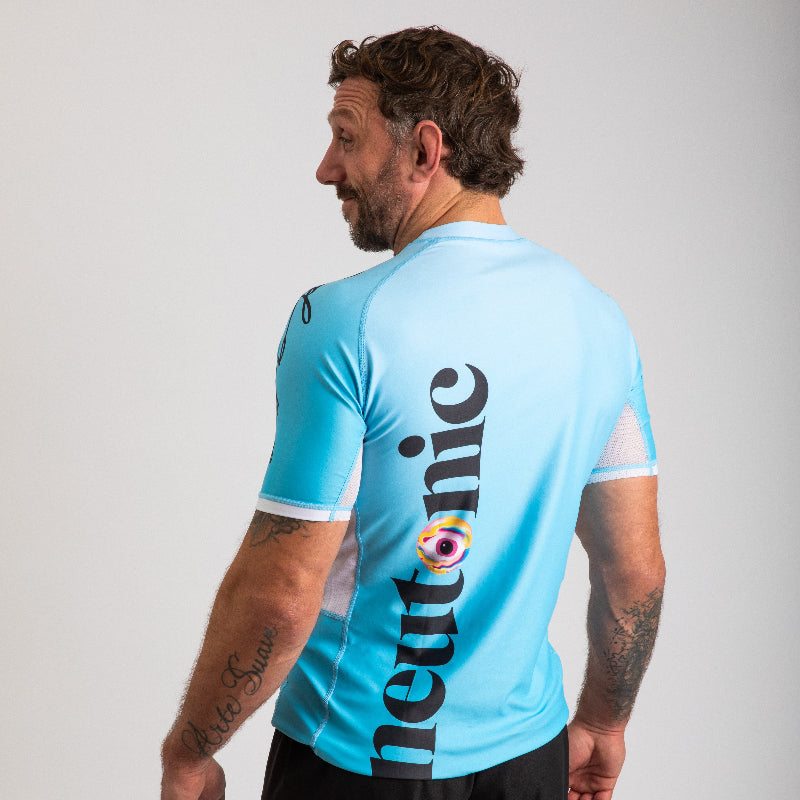Light blue men’s rash vest with “neutonic” and nootropics-inspired logo printed vertically on the back. - Neutonic - Neutonic Rash Vest - Men