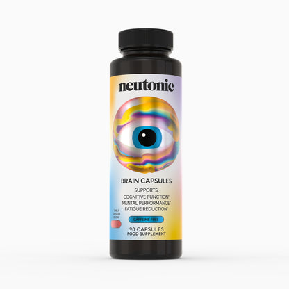 A bottle of Neuntonic Brain Capsules, featuring a black bottle with a colorful label showing a stylized eye and rainbow gradient.