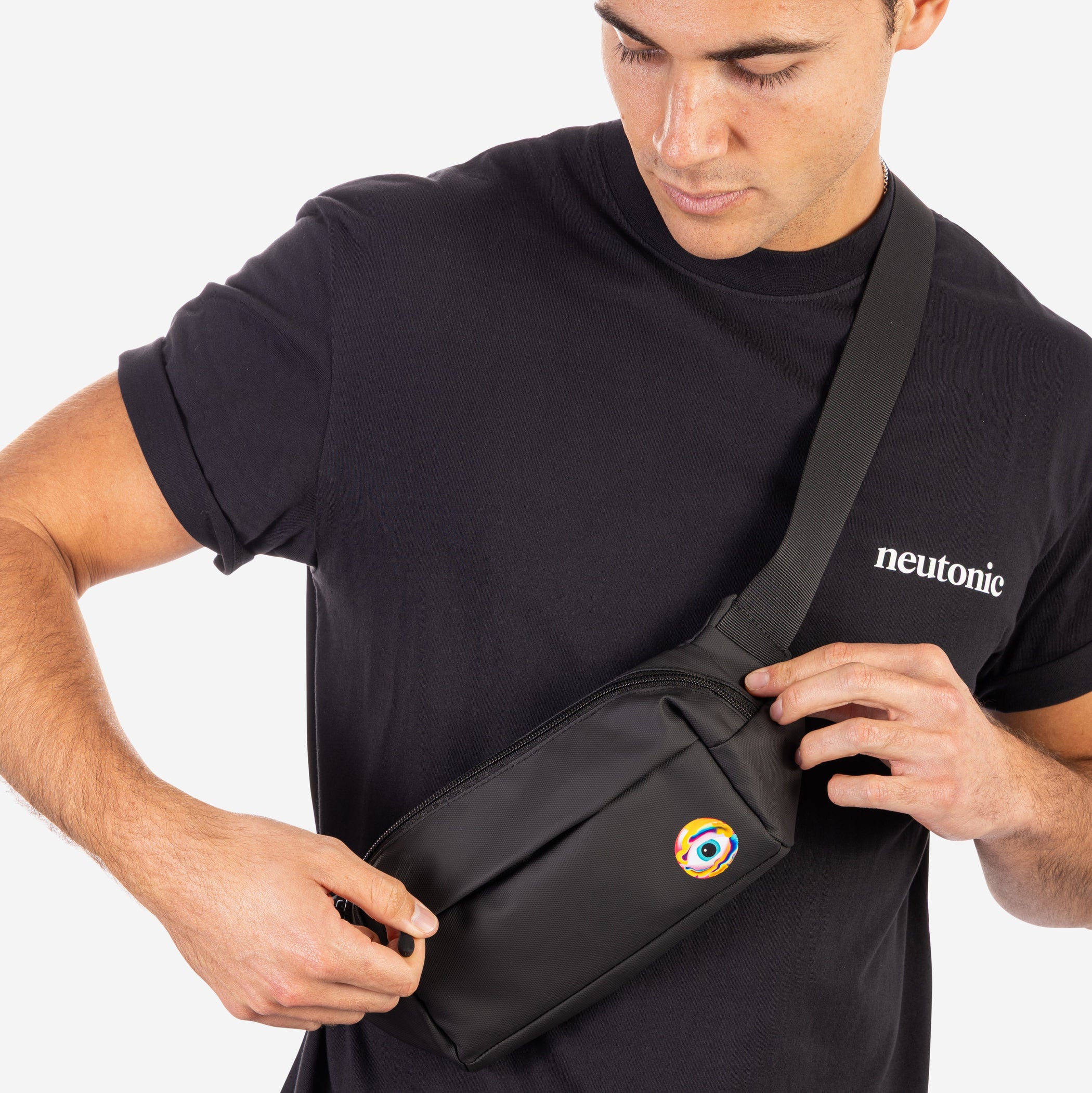 Black crossbody side bag with nootropics logo patch worn by man in black neotonic t-shirt. - Neutonic - Side Bag
