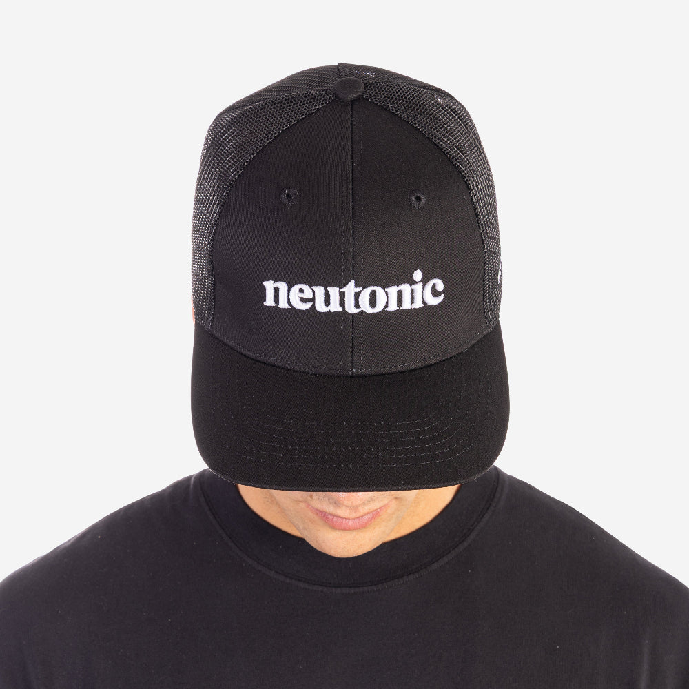 Black trucker cap with white "neutonic" logo, breathable mesh back, promoting nootropics. - Neutonic - Trucker Cap